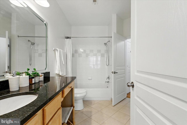 12000 Market St Unit 189, Reston, VA 20190 - bathroom featuring tile patterned floors, toilet, vanity, and shower / washtub combination