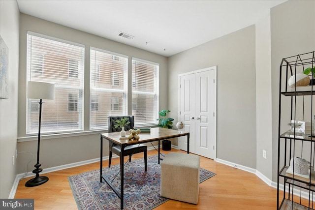 12000 Market St Unit 189, Reston, VA 20190 - office with baseboards, light wood-type flooring, and visible vents