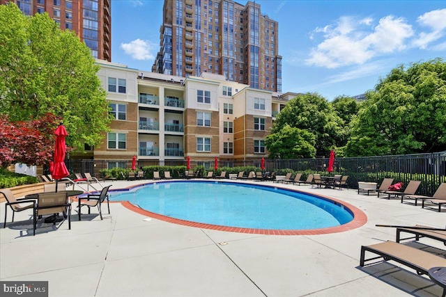 12000 Market St Unit 189, Reston, VA 20190 - pool with fence and a patio