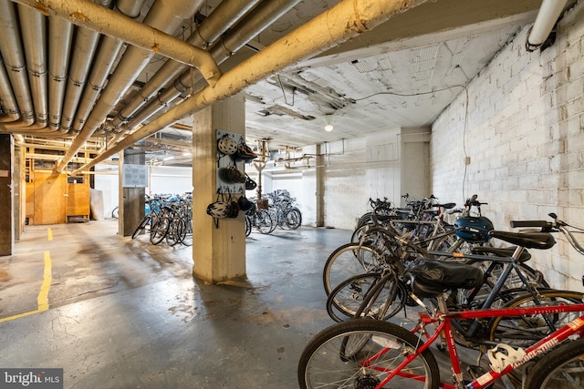garage with concrete block wall