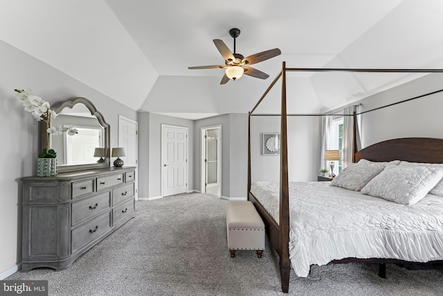 bedroom with baseboards, lofted ceiling, light colored carpet, and ceiling fan