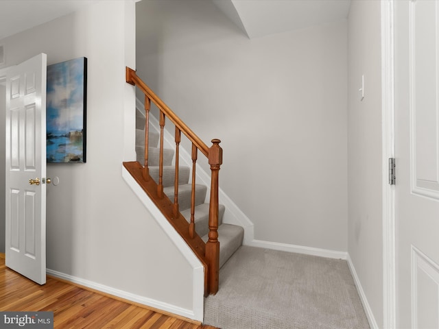 2607 Nisqually Ct, Silver Spring, MD 20906 - staircase with wood finished floors, visible vents, and baseboards