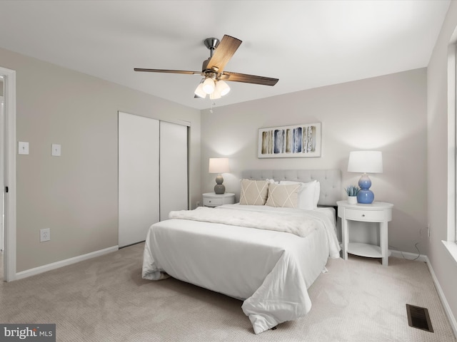 2607 Nisqually Ct, Silver Spring, MD 20906 - bedroom featuring baseboards, visible vents, a closet, and light colored carpet