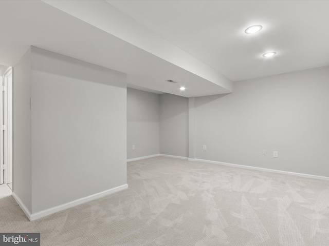 2607 Nisqually Ct, Silver Spring, MD 20906 - finished below grade area with baseboards, visible vents, and light colored carpet