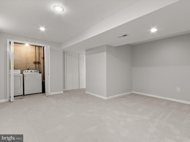 2607 Nisqually Ct, Silver Spring, MD 20906 - finished below grade area featuring light colored carpet, visible vents, separate washer and dryer, and baseboards