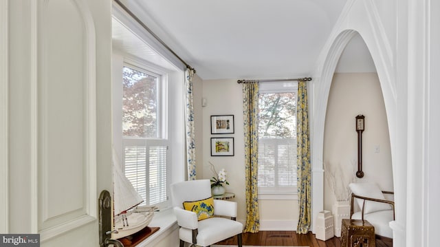 213 S Morris St, Oxford, MD 21654 - sitting room featuring visible vents, baseboards, wood finished floors, and a healthy amount of sunlight