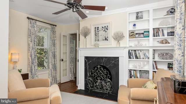 213 S Morris St, Oxford, MD 21654 - living room featuring recessed lighting, a premium fireplace, a ceiling fan, wood finished floors, and crown molding