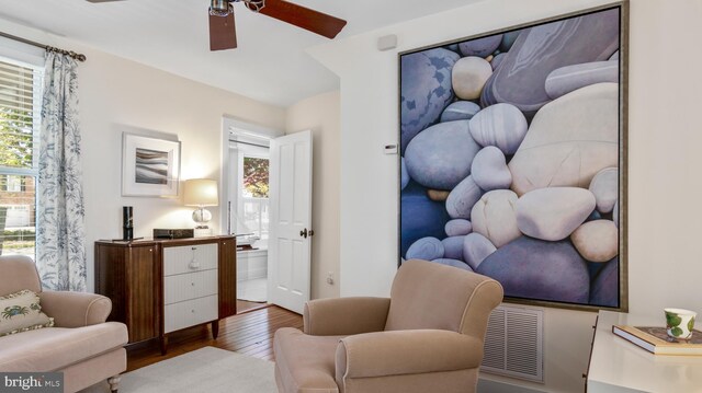 213 S Morris St, Oxford, MD 21654 - sitting room with visible vents, a ceiling fan, and wood finished floors