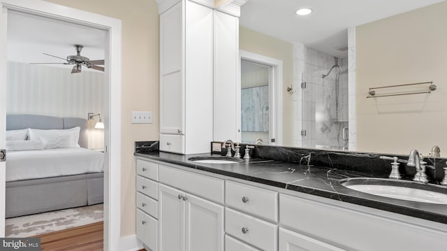 213 S Morris St, Oxford, MD 21654 - ensuite bathroom featuring a ceiling fan, a sink, recessed lighting, and a tile shower