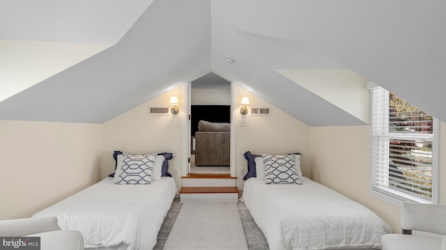 213 S Morris St, Oxford, MD 21654 - carpeted bedroom featuring vaulted ceiling and visible vents