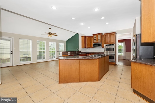 430 Timbermill Run, Emmitsburg, MD 21727 - kitchen featuring appliances with stainless steel finishes, vaulted ceiling, dark stone counters, recessed lighting, and a peninsula