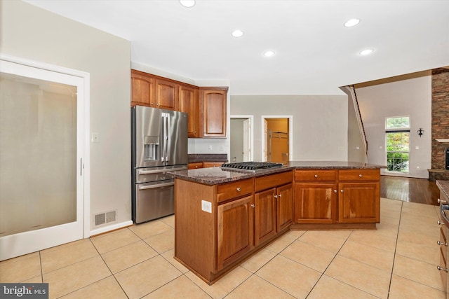 430 Timbermill Run, Emmitsburg, MD 21727 - kitchen with appliances with stainless steel finishes, a center island, dark stone counters, recessed lighting, and light tile patterned floors