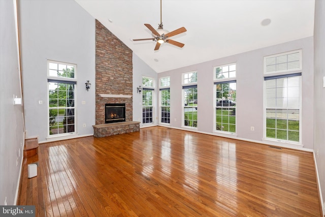 430 Timbermill Run, Emmitsburg, MD 21727 - unfurnished living room with high vaulted ceiling, wood-type flooring, plenty of natural light, a ceiling fan, and a stone fireplace