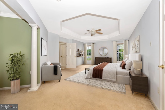 430 Timbermill Run, Emmitsburg, MD 21727 - bedroom featuring a tray ceiling, decorative columns, light carpet, and a ceiling fan