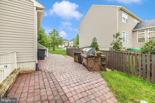 430 Timbermill Run, Emmitsburg, MD 21727 - view of patio featuring exterior kitchen, a grill, and fence