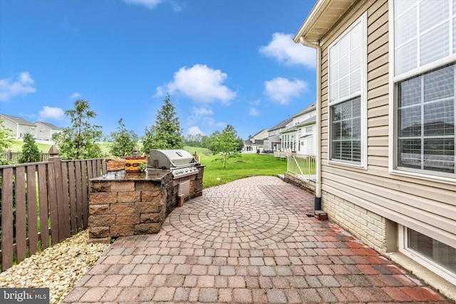 430 Timbermill Run, Emmitsburg, MD 21727 - view of patio featuring an outdoor kitchen, a residential view, area for grilling, and fence