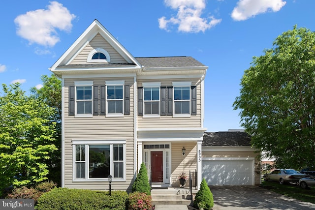8903 Screech Owl Ct, Gainesville, VA 20155 - view of front of home with concrete driveway, a garage, and a shingled roof
