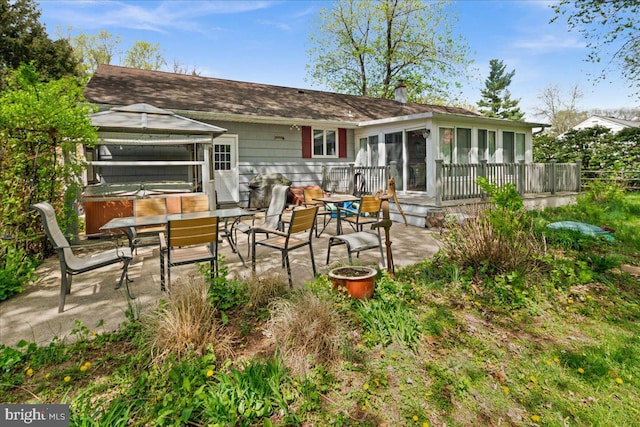 13 Morningside Dr, Pennington, NJ 08534 - back of property featuring a jacuzzi, a patio, a sunroom, and a gazebo