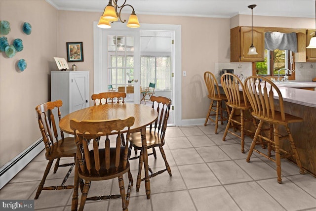 13 Morningside Dr, Pennington, NJ 08534 - dining space featuring a baseboard heating unit, ornamental molding, and light tile patterned floors