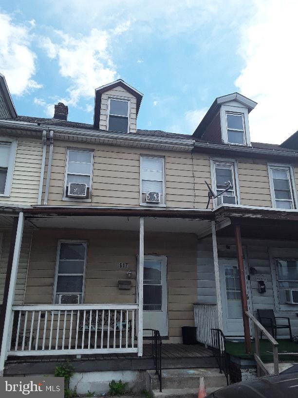 617 S Front St, Steelton, PA 17113 - townhome / multi-family property with a porch