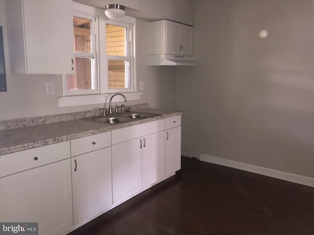617 S Front St, Steelton, PA 17113 - kitchen with a sink, white cabinets, and light countertops