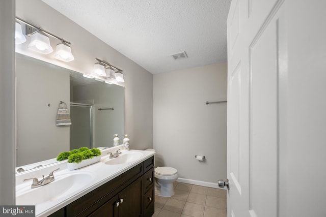 full bathroom featuring visible vents, a sink, a stall shower, and toilet