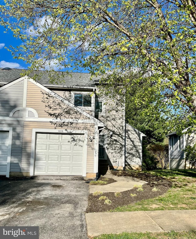 4658 Winterberry Ln, Oxon Hill, MD 20745 - view of front of home featuring driveway and a garage