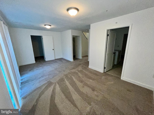 4658 Winterberry Ln, Oxon Hill, MD 20745 - unfurnished bedroom featuring carpet and baseboards