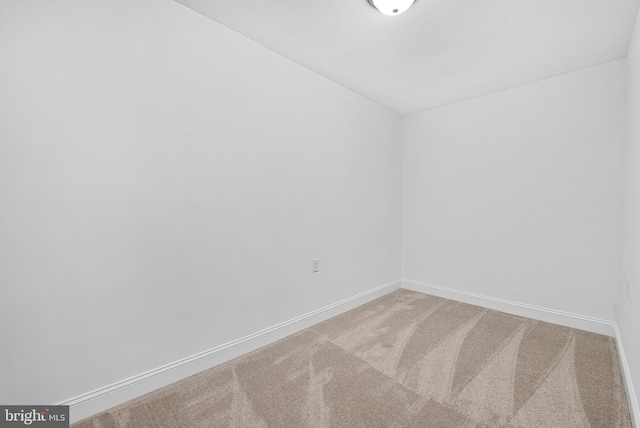 4658 Winterberry Ln, Oxon Hill, MD 20745 - carpeted empty room with baseboards
