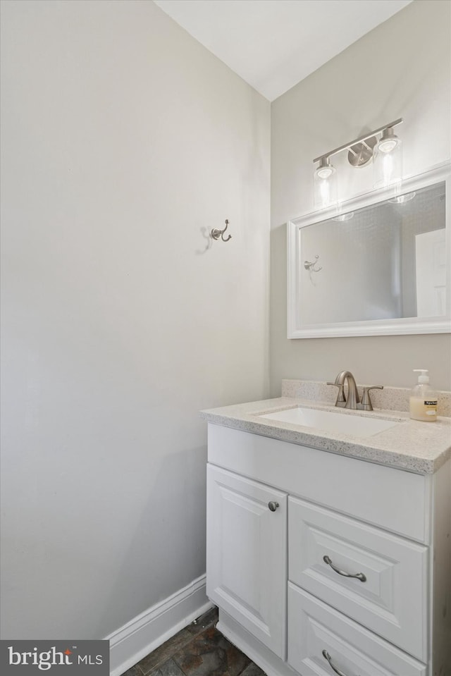 102 Orchard Ct, Royersford, PA 19468 - bathroom featuring vanity, baseboards, and stone finish flooring
