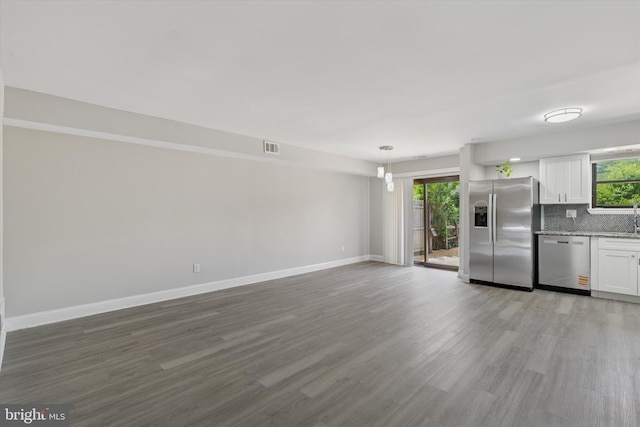 102 Orchard Ct, Royersford, PA 19468 - kitchen featuring appliances with stainless steel finishes, white cabinetry, baseboards, and wood finished floors