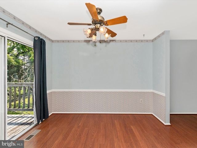 7250 Single Wheel Path, Columbia, MD 21046 - unfurnished room with wood finished floors, wainscoting, wallpapered walls, baseboards, and ceiling fan