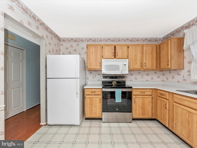7250 Single Wheel Path, Columbia, MD 21046 - kitchen featuring white appliances, wallpapered walls, light floors, and light countertops