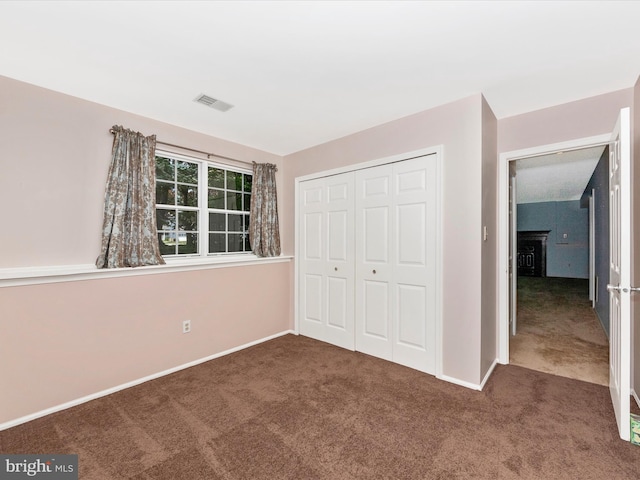 7250 Single Wheel Path, Columbia, MD 21046 - unfurnished bedroom with carpet floors, a closet, and baseboards