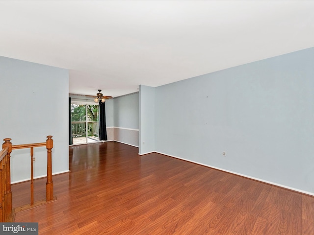 7250 Single Wheel Path, Columbia, MD 21046 - empty room with wood finished floors, ceiling fan, and baseboards