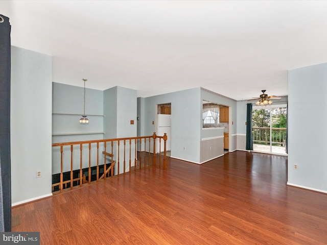 7250 Single Wheel Path, Columbia, MD 21046 - unfurnished room featuring wood finished floors, ceiling fan, and baseboards