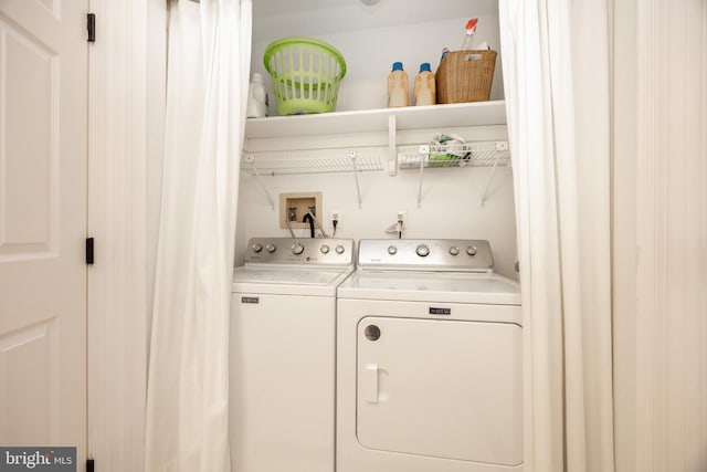 laundry area with laundry area and washing machine and dryer