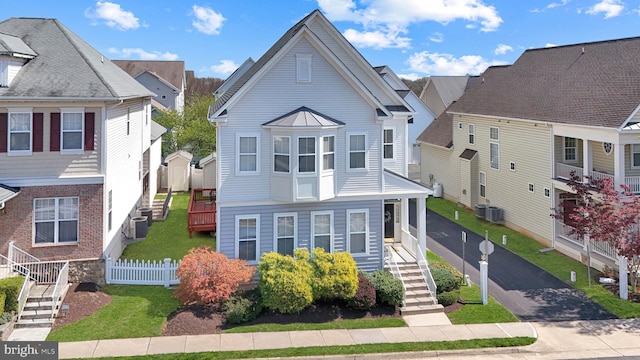 17435 Lethridge Cir, Round Hill, VA 20141 - view of front of home with stairway, a residential view, and cooling unit