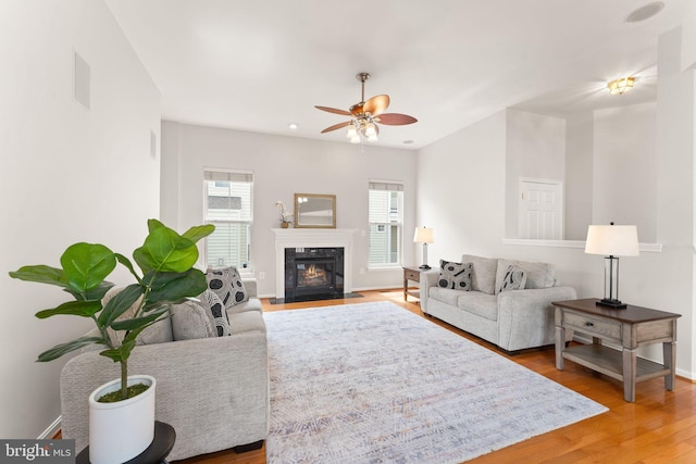 17435 Lethridge Cir, Round Hill, VA 20141 - living room featuring wood finished floors, ceiling fan, a high end fireplace, baseboards, and recessed lighting
