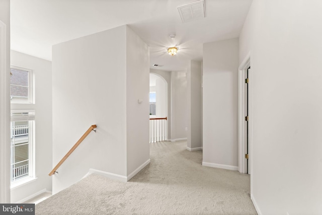 17435 Lethridge Cir, Round Hill, VA 20141 - corridor featuring an upstairs landing, carpet, arched walkways, and baseboards