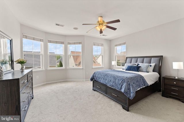 17435 Lethridge Cir, Round Hill, VA 20141 - bedroom with light carpet, baseboards, and a ceiling fan