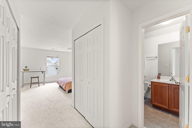 17435 Lethridge Cir, Round Hill, VA 20141 - hallway with a sink and light tile patterned floors