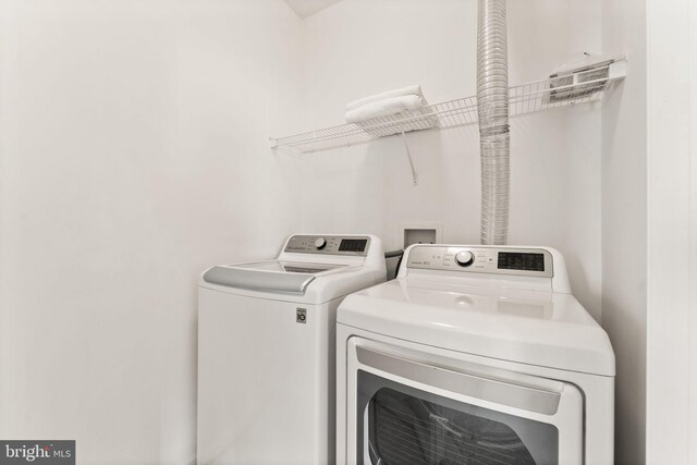 17435 Lethridge Cir, Round Hill, VA 20141 - washroom featuring washing machine and clothes dryer