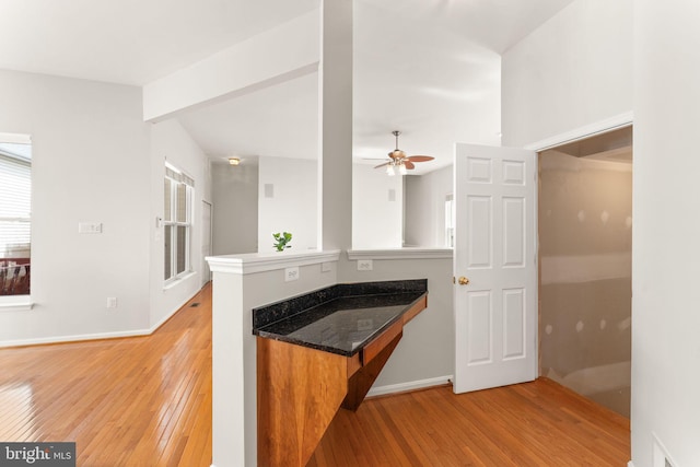 17435 Lethridge Cir, Round Hill, VA 20141 - kitchen featuring light wood-style floors, ceiling fan, a peninsula, and baseboards