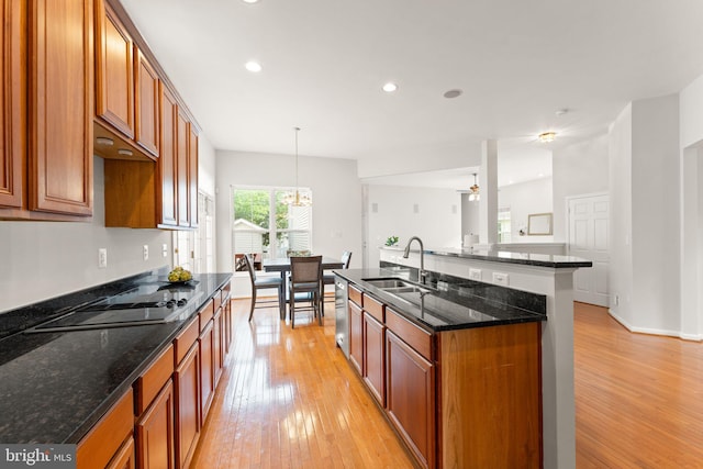 17435 Lethridge Cir, Round Hill, VA 20141 - kitchen featuring a sink, black electric stovetop, light wood-style flooring, dishwasher, and recessed lighting