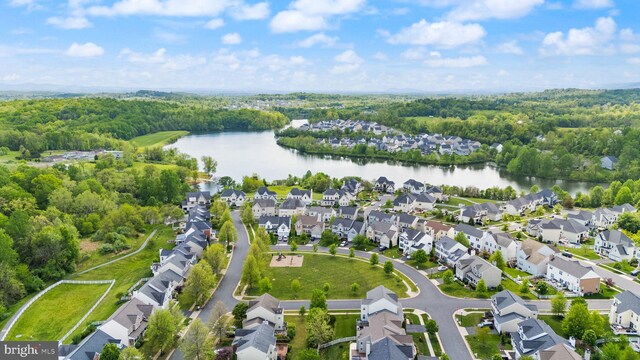 17435 Lethridge Cir, Round Hill, VA 20141 - aerial overview of property's location with a large body of water, a heavily wooded area, and nearby suburban area