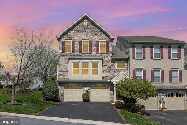 1901 Roxbury Ct, Mechanicsburg, PA 17055 - view of front of home with an attached garage, aphalt driveway, and stone siding
