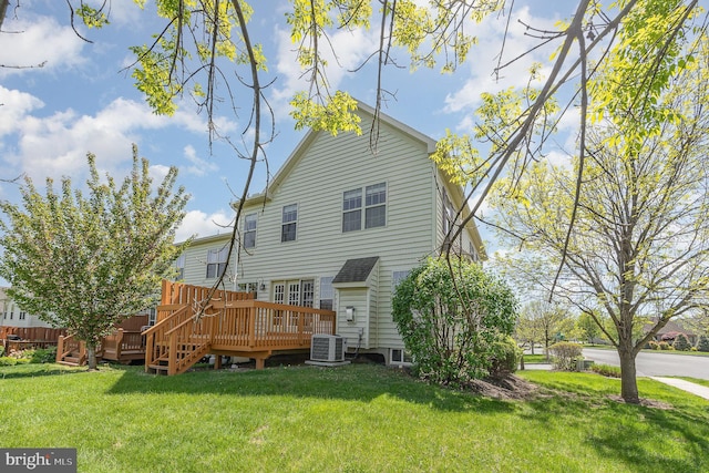 1901 Roxbury Ct, Mechanicsburg, PA 17055 - rear view of house with a lawn, cooling unit, and a wooden deck