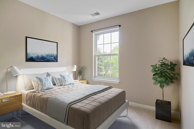carpeted bedroom featuring baseboards, visible vents, and multiple windows