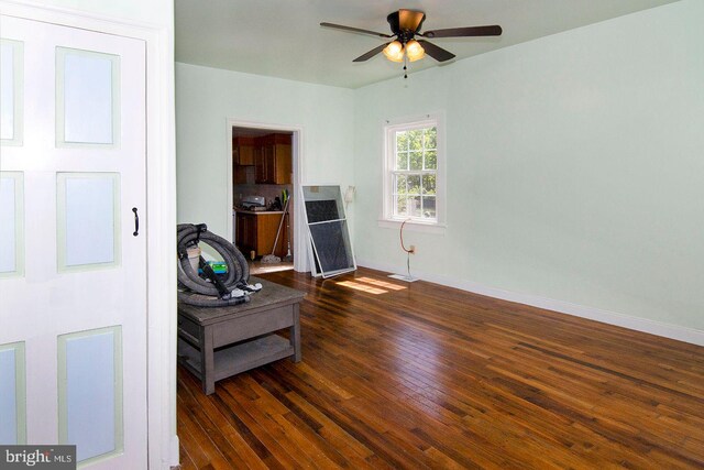 330 E Broadway, Salem, NJ 08079 - sitting room featuring dark wood-style flooring, ceiling fan, and baseboards